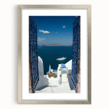 Extra large wall art of Santorini with textured white buildings and blue domes, printed on a framed matte canvas.