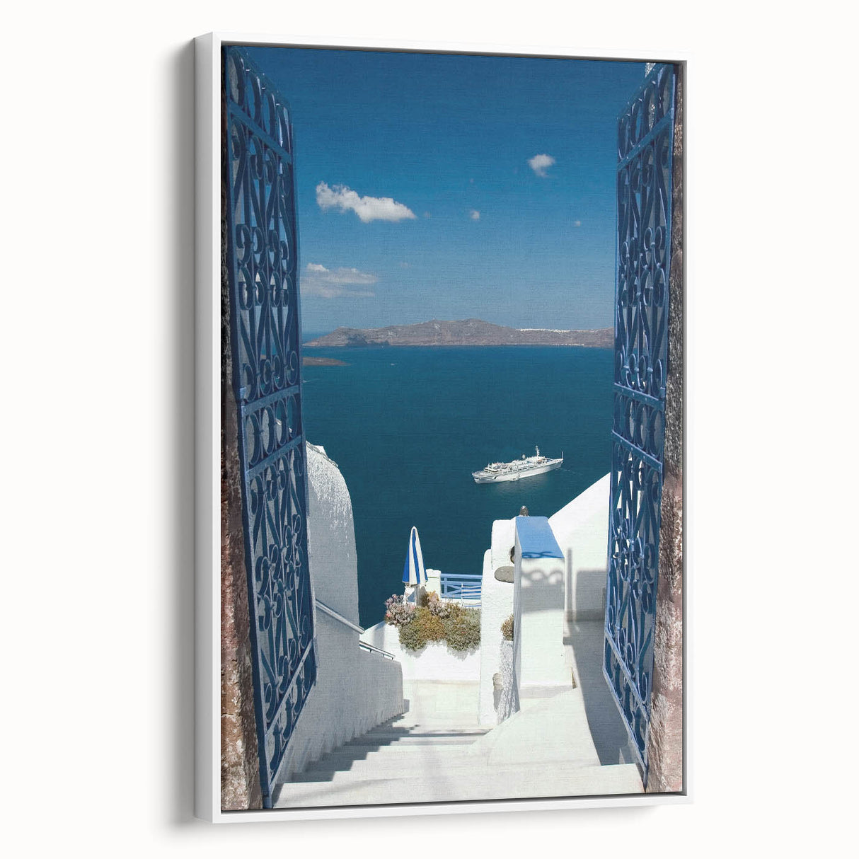Vintage poster art of Santorini with vibrant blue and white hues on framed canvas, ideal for living room decor.