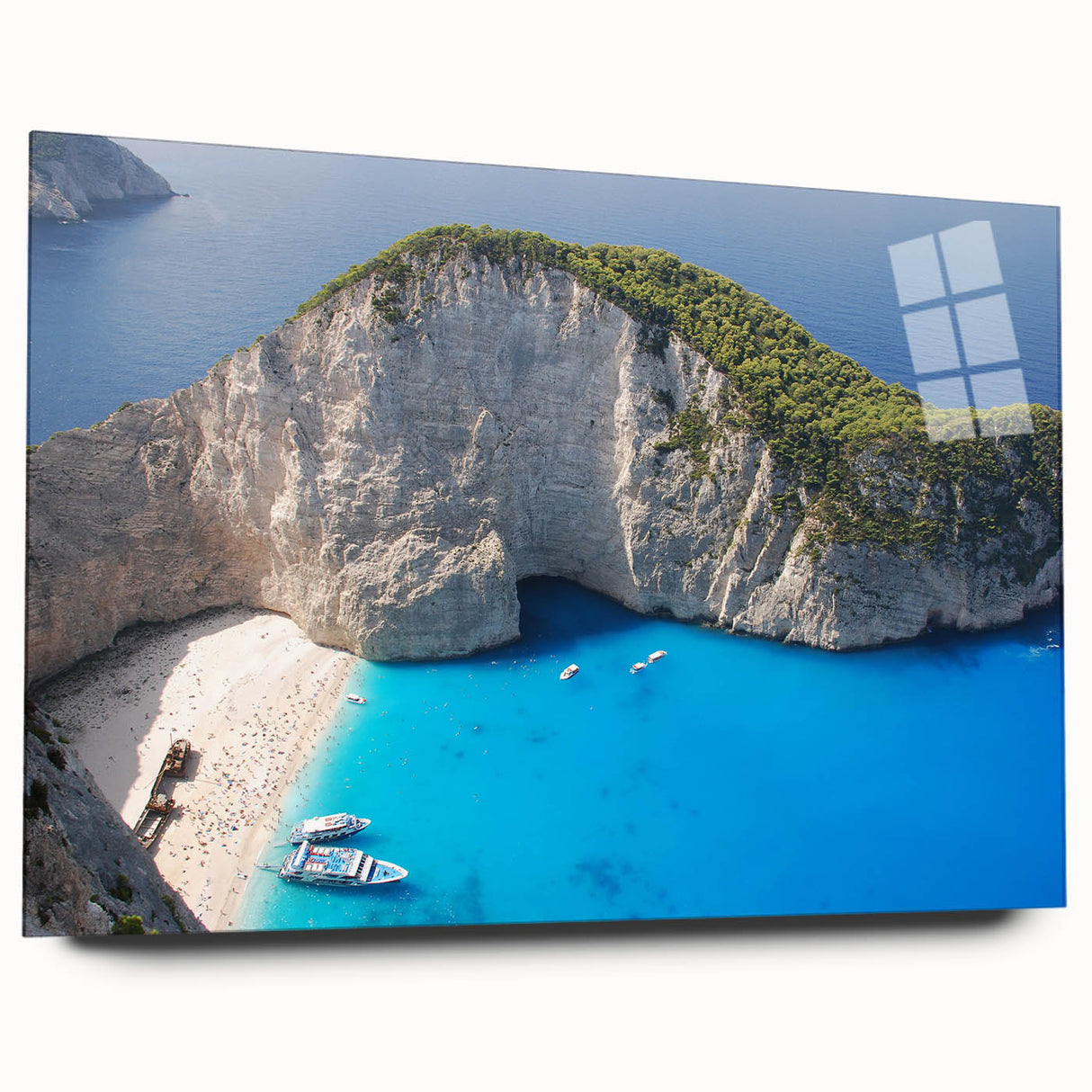 Large abstract depiction of a European coastal town in muted blue and white tones on acrylic glass.