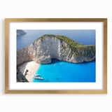 Abstract art print of a European Greek landscape in muted gold and blue tones on a framed canvas.