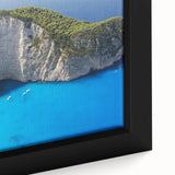 Framed canvas depicting a textured, colorful European scenery with dominant black tones.