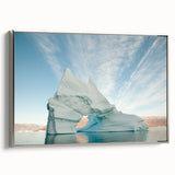 Framed canvas featuring a vintage-style landscape painting of Greenland, with muted green and blue tones.