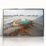 Large art print of an Icelandic landscape in muted earth tones on a silver-framed acrylic.