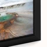 Framed canvas featuring a textured Icelandic landscape in black with vibrant color accents.