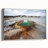 Framed canvas featuring a vintage-style landscape art painting of Icelandic scenery, with vibrant green and blue tones.