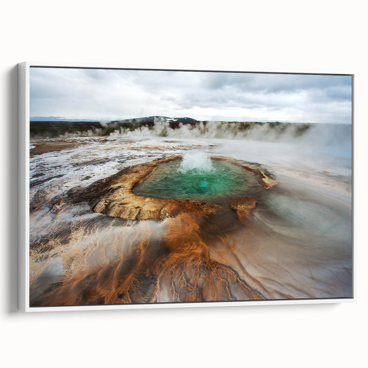 Vintage poster art of an Icelandic landscape on a framed canvas, featuring a black border and vibrant color palette.