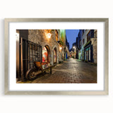 Textured abstract art print of an Irish landscape, muted green and earth tones, framed with a silver mat.