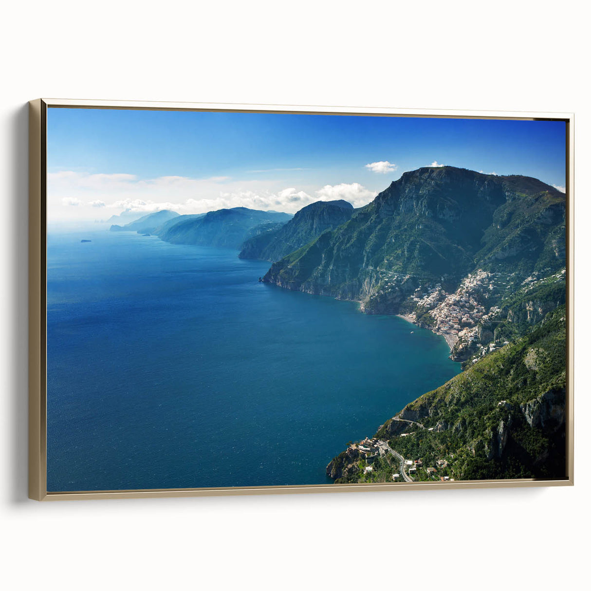 Framed canvas wall art featuring the Amalfi Coast in a vintage poster style, with a palette of blues and golds.