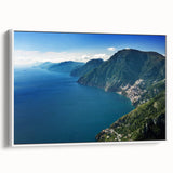 Vintage poster art of Amalfi Coast with vibrant colors on a framed canvas, ideal for living room decor.