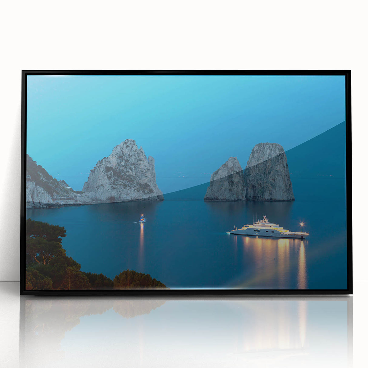 Large abstract wall art depicting the Capri coastline in muted blue and green tones on a black framed acrylic print.