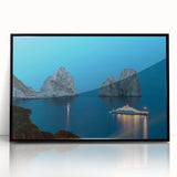 Large abstract wall art depicting the Capri coastline in muted blue and green tones on a black framed acrylic print.