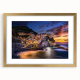 Abstract art print of Cinque Terre with vibrant coastal colors on a gold-framed mat, ideal for dining room decor.