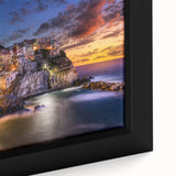 Framed canvas of Cinque Terre with textured colorful art on black background, ideal for living room decor.