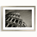 Extra large framed wall art of an abstract Colosseum in Italy, using textured brush strokes in muted earth tones.