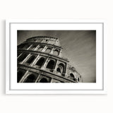 Textured art print of the Colosseum in muted earth tones on a framed white mat, suitable for bedroom decor.