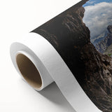 Art deco poster of the Dolomites in Italy, featuring muted earth tones on a rolled canvas, ideal for nursery wall art.