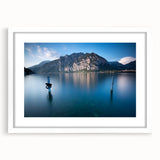 Textured art of Lake Como with abstract elements in muted blue and green shades, framed with a white mat.