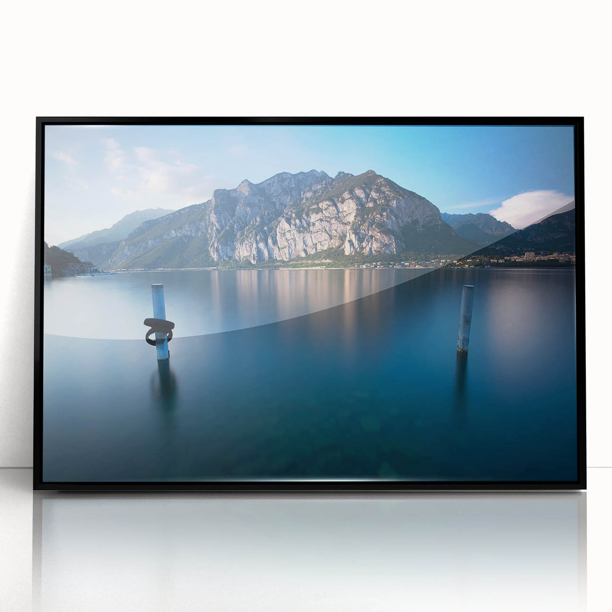 Framed acrylic print of Lake Como with muted blue and green tones in a mid-century modernist style.