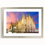 Extra large abstract art print of Milan scenery in muted earth tones on a textured canvas, framed in silver.