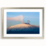 Extra large abstract art print of Mount Etna, featuring textured hues of orange and gray, framed in silver.