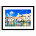 Extra large, colorful abstract art print of a European scenery, framed in black, suitable for living room decor.