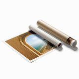 Rolled print of Sicilian landscape with floral foreground in soft pastel colors.