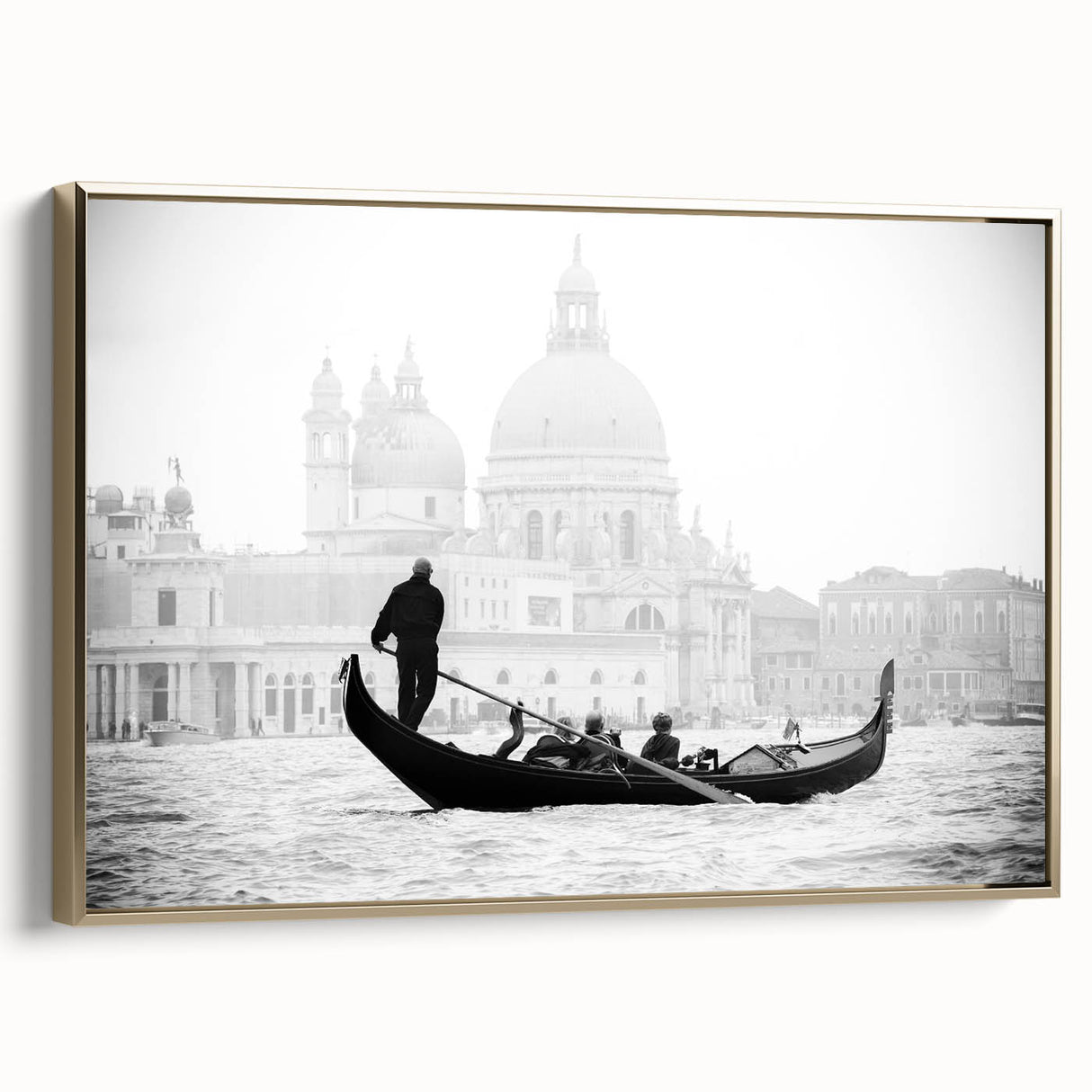 Framed canvas featuring a vintage-style landscape painting of Venice in muted gold and black tones.