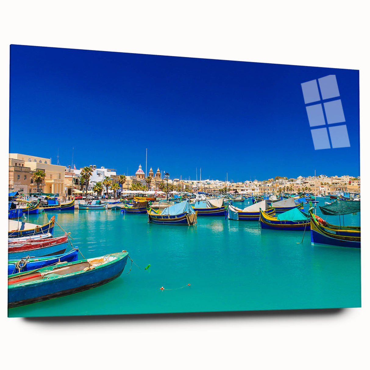 Large abstract wall art of Malta scenery in vibrant blue and green hues on acrylic glass.