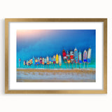 Abstract art print of the Mediterranean Sea in muted blue and white tones, framed in gold, suitable for dining room decor.