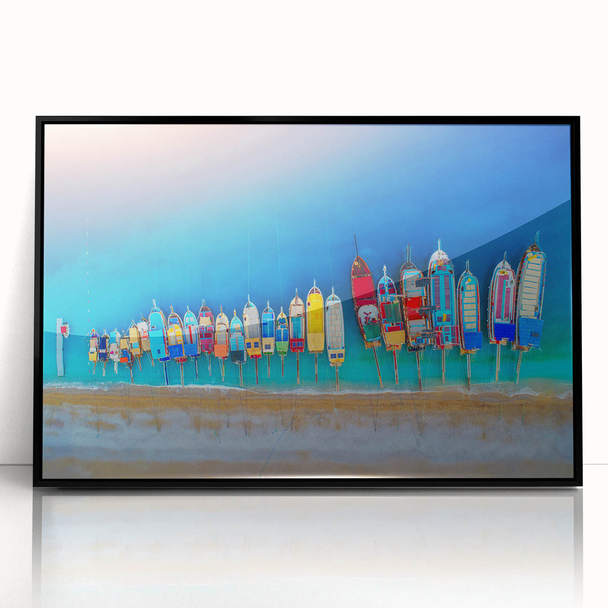 Large abstract wall art depicting the Mediterranean Sea, in muted blue and white tones, framed in black acrylic.