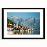 Colorful abstract art print of a European scenery in Montenegro, displayed in a black frame with mat.