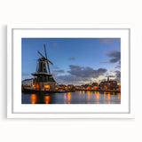 Textured art of Amsterdam scenery in abstract style, featuring muted earth tones on a framed white mat.