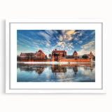 Textured art print of an abstract European scenery in muted earth tones, framed with a white mat.