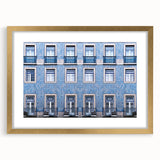 Abstract art print of Lisbon skyline with gold frame, featuring soft pastel shades, ideal for dining room decor.