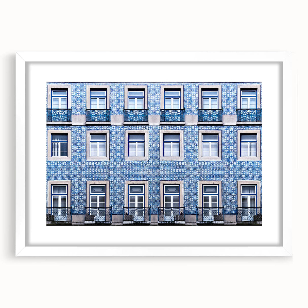 Textured art print of Lisbon scenery in abstract style with muted earth tones on a framed white mat.