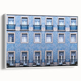 Vintage poster art of Lisbon scenery in vibrant colors on a large framed canvas, suitable for living room decor.