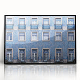 Large abstract wall art depicting Lisbon's urban scenery in muted greens and blues on a framed acrylic.