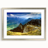 Extra large abstract art print of a textured European scenery in muted earth tones, framed in silver.