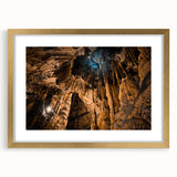 Abstract art print of a European scenery in muted earth tones, framed in gold, suitable for dining room decor.