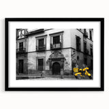 Colorful abstract art print of Andalucia, Spain, in a black frame, ideal for living room decor.