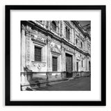 Extra large abstract art print of Barcelona scenery in vibrant colors on a textured canvas, framed in black.