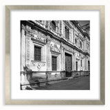 Extra large abstract art print of Barcelona scenery in silver frame, featuring textured brush strokes in muted earth tones.