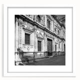 Textured abstract art print depicting the Barcelona skyline in muted gray and blue tones.