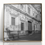 Large art print of Barcelona scenery in gold-framed acrylic, featuring mid-century modernist style.