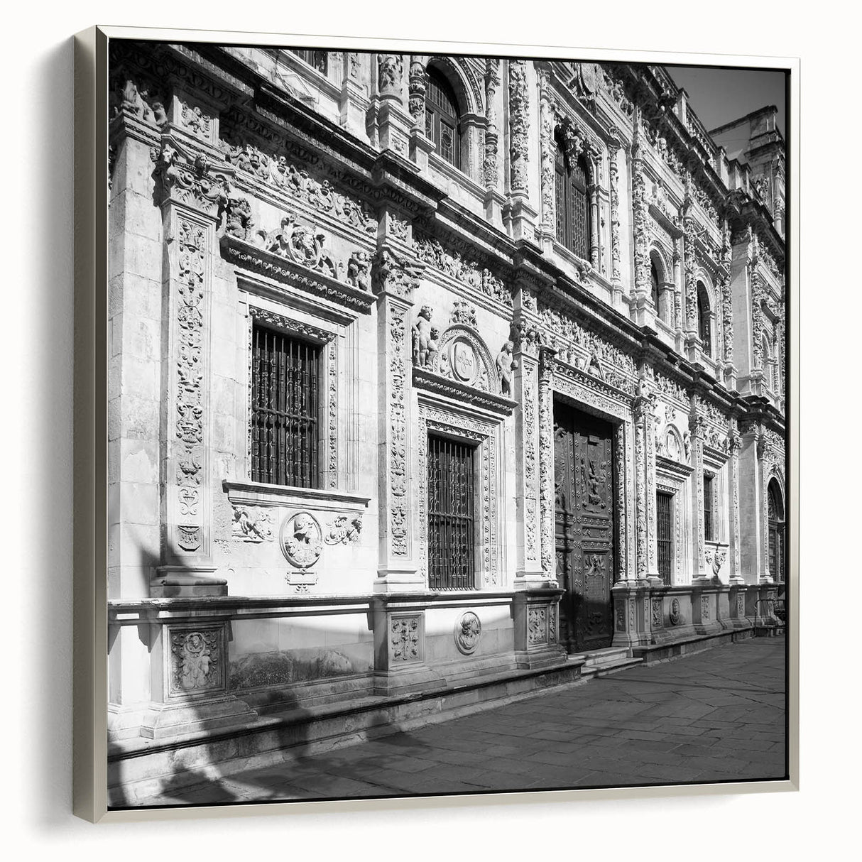 Framed canvas of a vintage Barcelona landscape painting in muted colors.