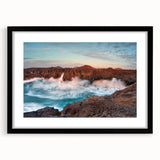 Abstract art print of a vibrant, colorful European scenery on a textured, extra large canvas, framed in black.