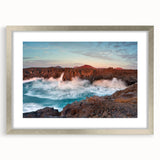 Extra large abstract art print of a textured European scenery in muted earth tones, framed in silver.