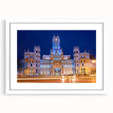 Abstract art print of Madrid skyline in muted gray and blue tones, framed with a white mat, ideal for dining room decor.