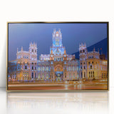 Large art print of Madrid skyline in gold acrylic frame, featuring mid-century modernist style with muted earth tones.