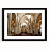 Abstract art print of vibrant, colorful scenery depicting Valencia, Spain, in a large black frame with mat.